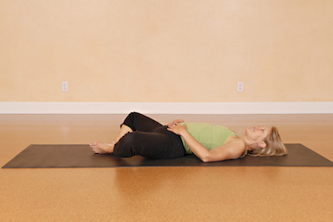reclined cobbler pose yoga for fertility 